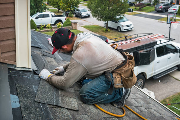 Professional Flat Roof Repair technician working in Casco, ME